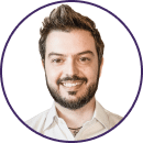 Smiling man with short, styled hair and beard, wearing a light-colored collared shirt, shown in a circular frame with a white background. Ideal for Deloitte or Cyber iCON 2024 professional profiles.