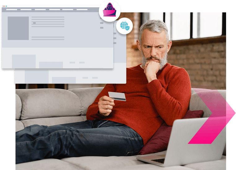 A man sits on a couch holding a credit card and looking at a laptop screen, appearing to shop or make an online payment, while security measures work in the background to stop more ATOs.